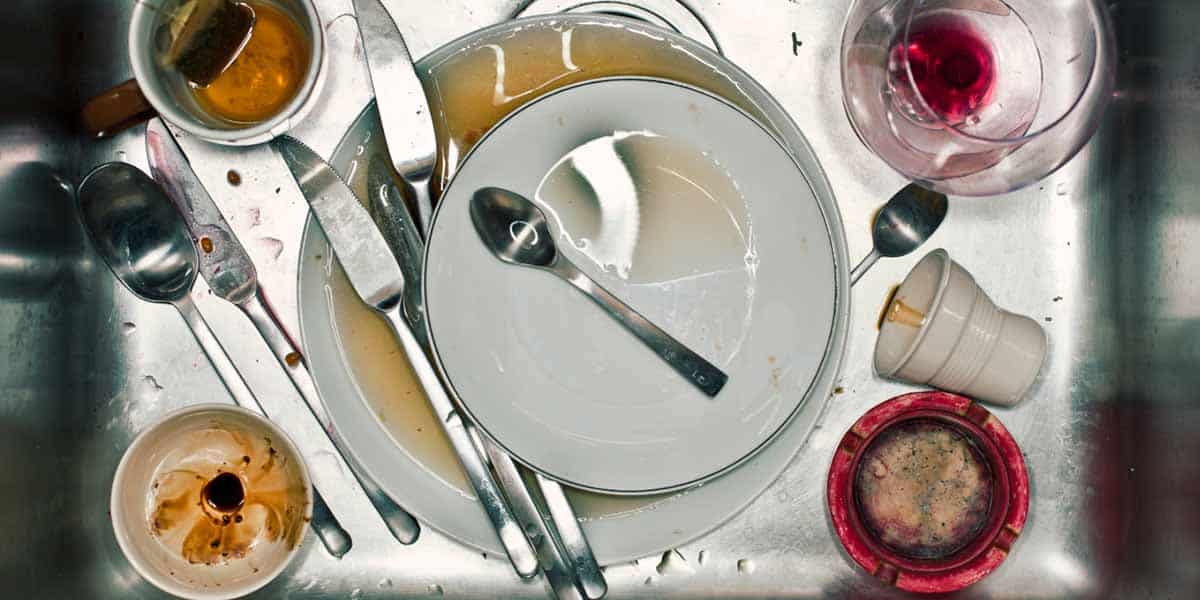 Dirty Dishes In Sink with Rotting Food