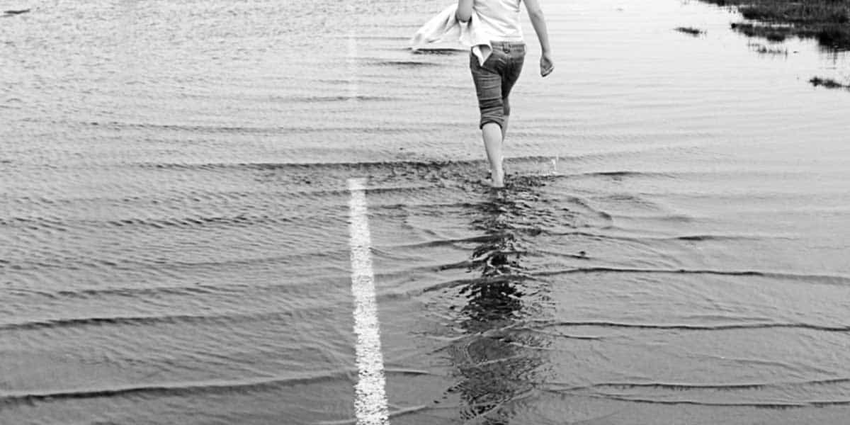 Walking in a Flooded Street